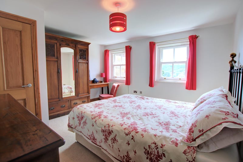 One of the double bedrooms with far reaching valley views.
