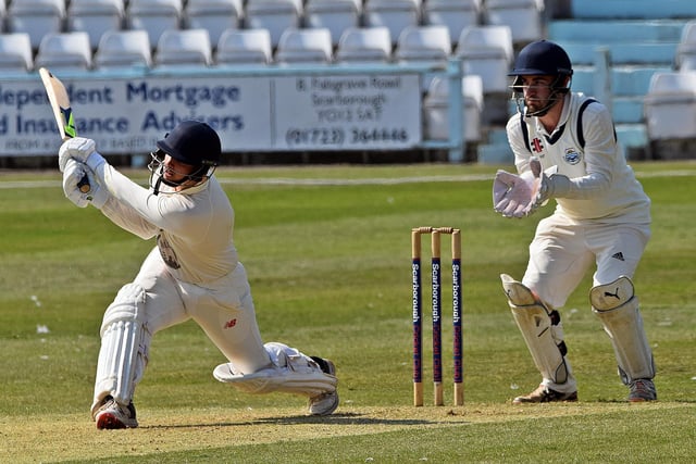 Scarborough all-rounder Jack Redshaw plays the slog sweep