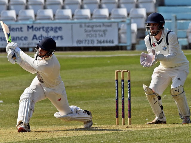 Scarborough all-rounder Jack Redshaw plays the slog sweep