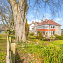 The stunning Sleights property has wrap-around gardens.