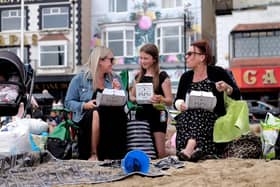 Enjoying fish and chips on the beach