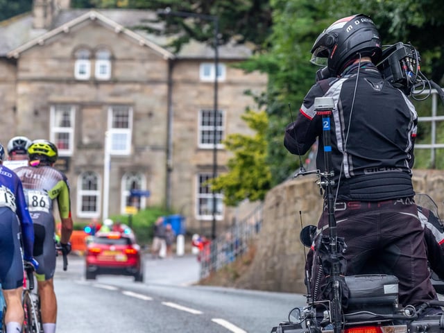 Up close and capturing the big race action on camera.