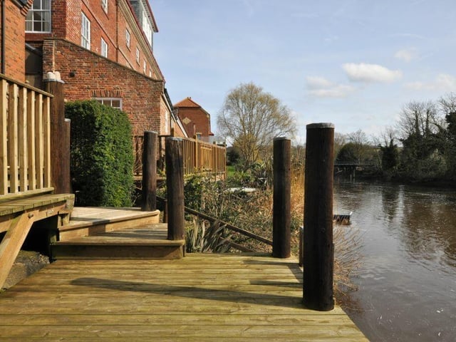 The riverside setting is a natural sun spot.