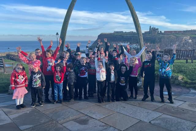 Oakridge School youngsters looking festive at Whitby whalebones.