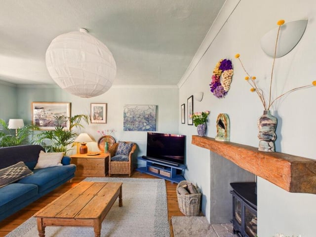 This family lounge has French doors to an outside terrace.