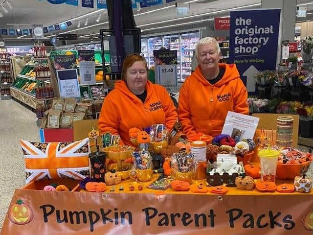 Pumpkin parent packs in memory of Lydia raised money in a Whitby Co-op with their Halloween themed wares.