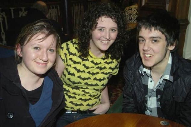 Steph, Emily, and Ashley enjoy drinks in Wetherspoons.