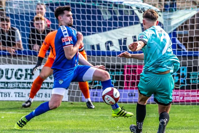 Aaron Cunningham made a crucial late block to maintain Whitby's lead at Gainsborough