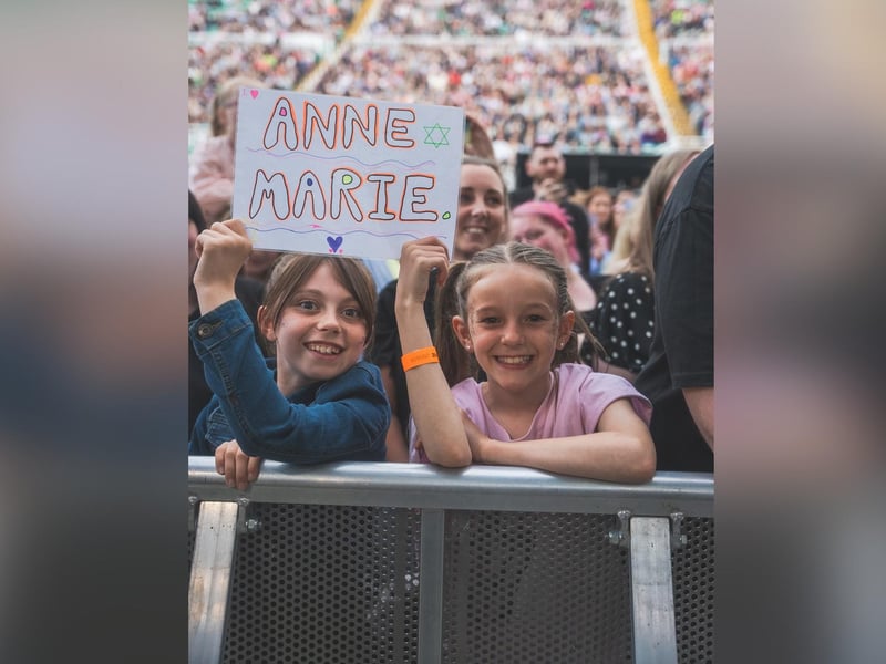 Young fans eager to see Anne-Marie.