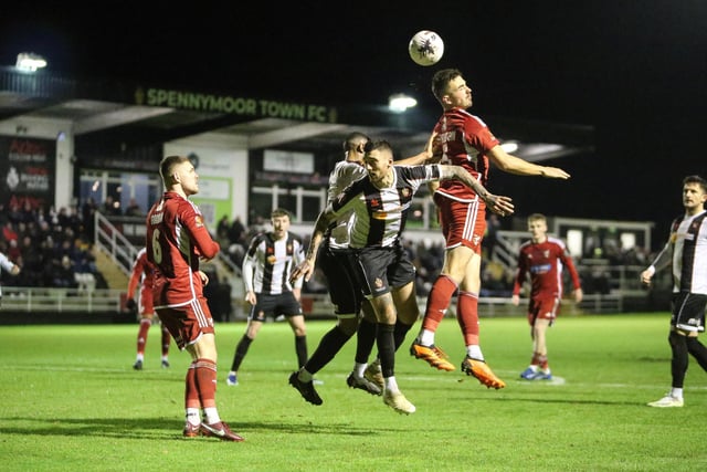 Boro defender Will Thornton wins a header at Brewery Field.