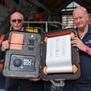Colin Woodhead and Roger Buxton after signing the scroll. Image: RNLI/Laura Lyth