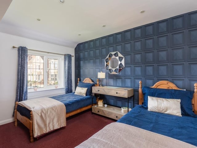 A double or twin-bedded room within the house.