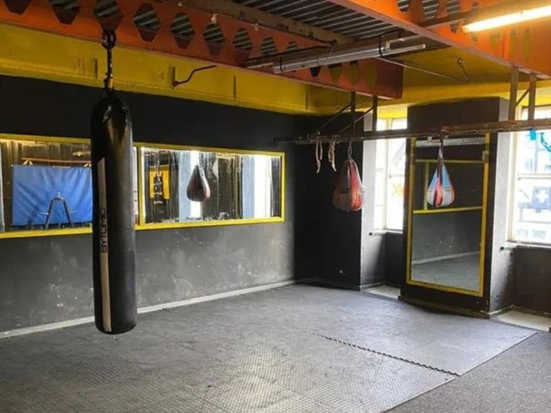 The entrance leads to the main gym suite consisting of cardio area, weightlifting stations. Through the main gym is the boxing area with soft foam flooring.