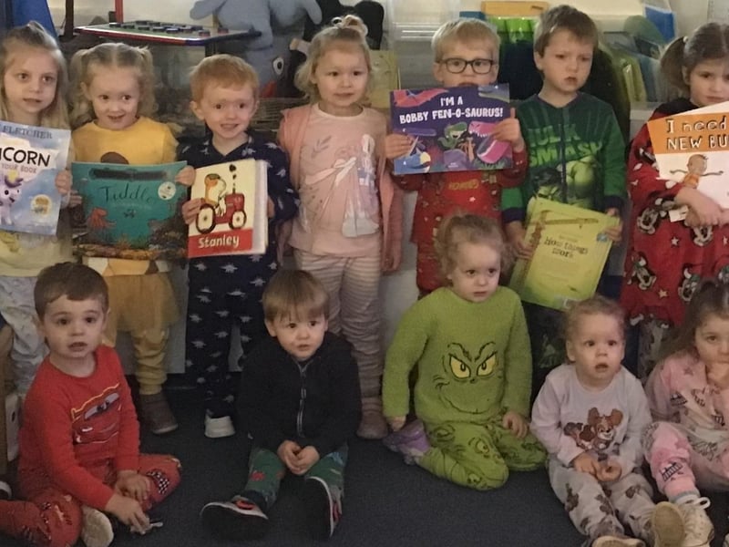 East Whitby Academy nursery youngsters with their books.