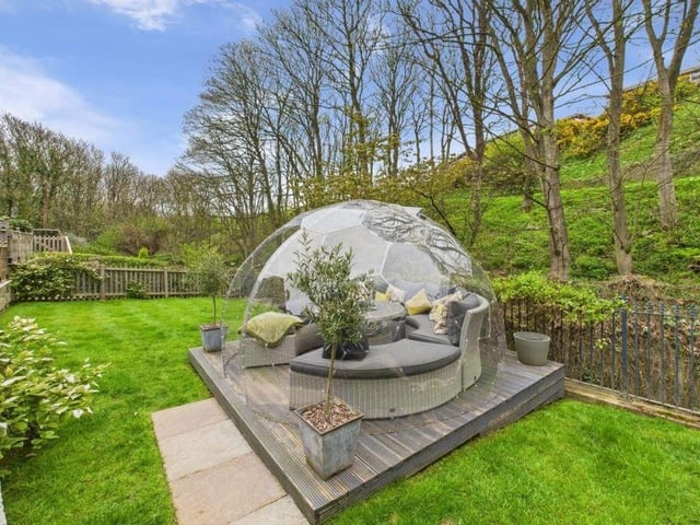 The garden geodome has a beautiful setting, and allows year-round enjoyment of the seasons.