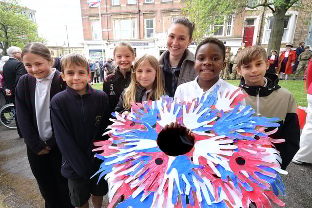 St Peter's Primary School with a wreath made by the students.