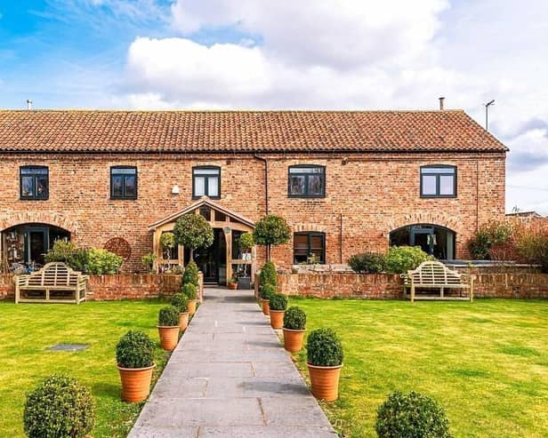 Chestnut Barn stands within impressive gardens and has a double garage.