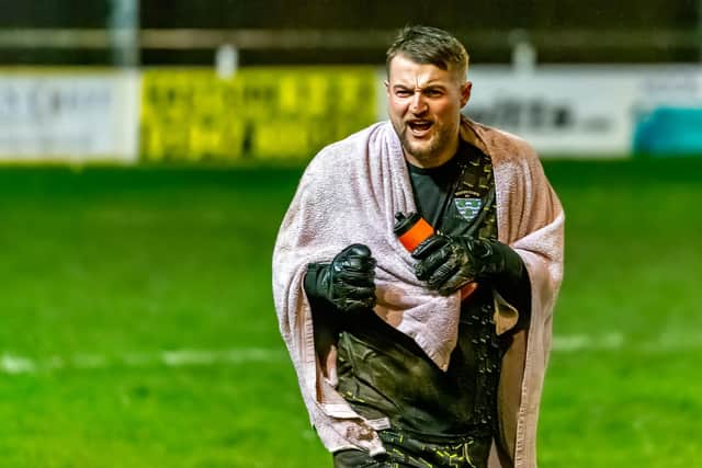 Blues keeper Shane Bland celebrates the late draw v Hyde