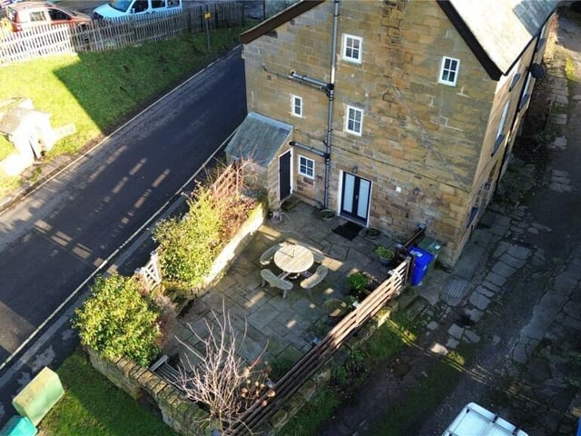 An overview of the cottage with its west-facing courtyard style garden.