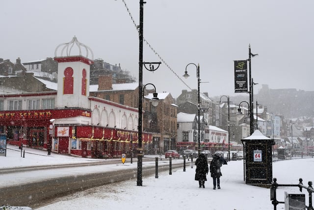 Snow falling on South Bay