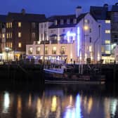 The New Angel Hotel at night.