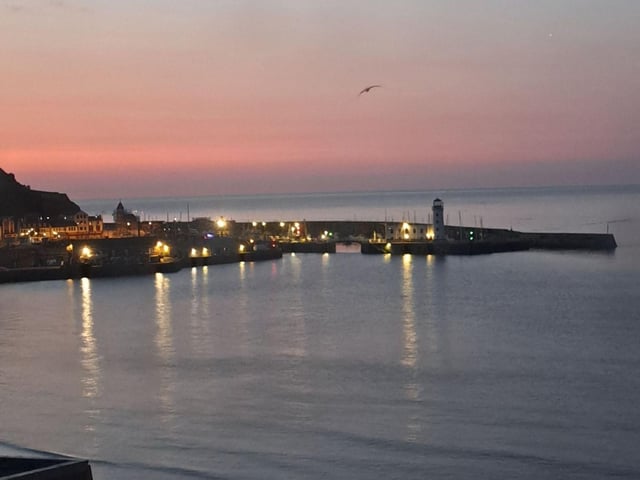 A stunning sunrise from a hotel room in The Grand, Scarborough.