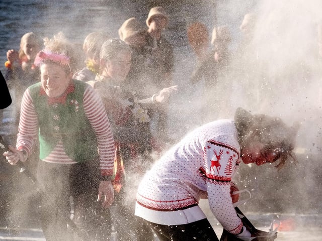 The Crazy Raft Race commences with a flour fight