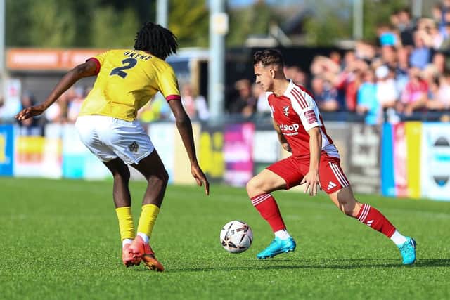 Winger Cam Wilson on the attack for the home team.