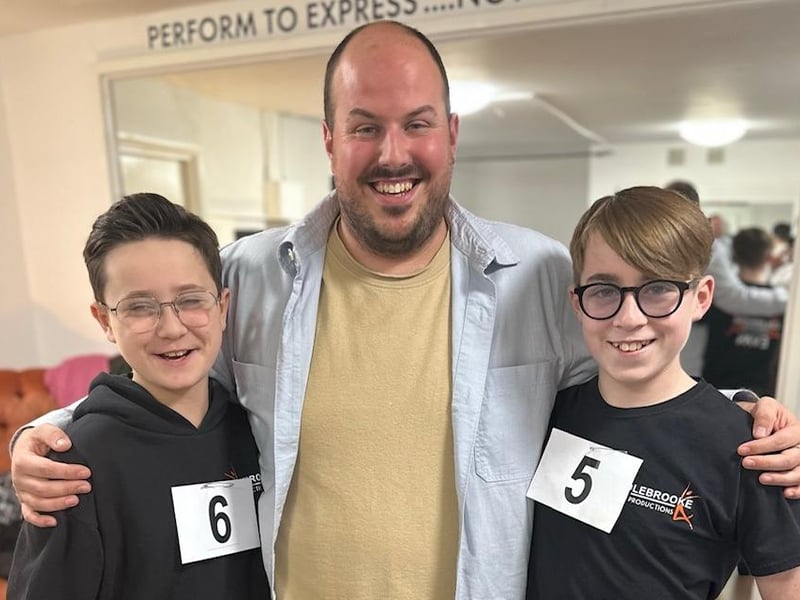 Evan Lunn and Albie Clarkson with teacher, Josh Harrison.