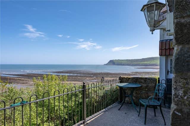 The property's rear terrace has amazing views across the bay.