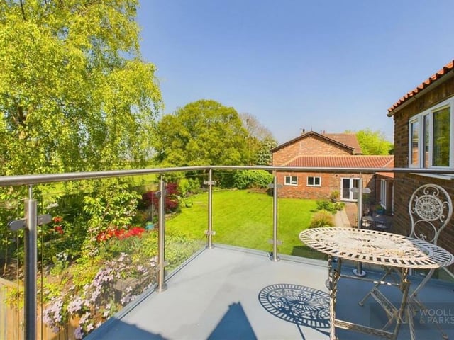 The main bedroom's balcony looks over the garden.