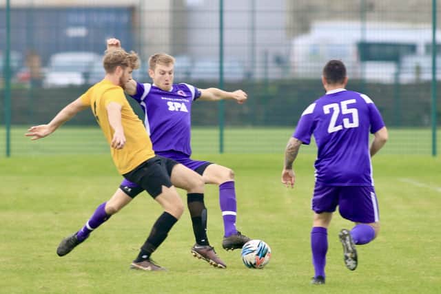 Action from the ER League. Photos by TCF Photography