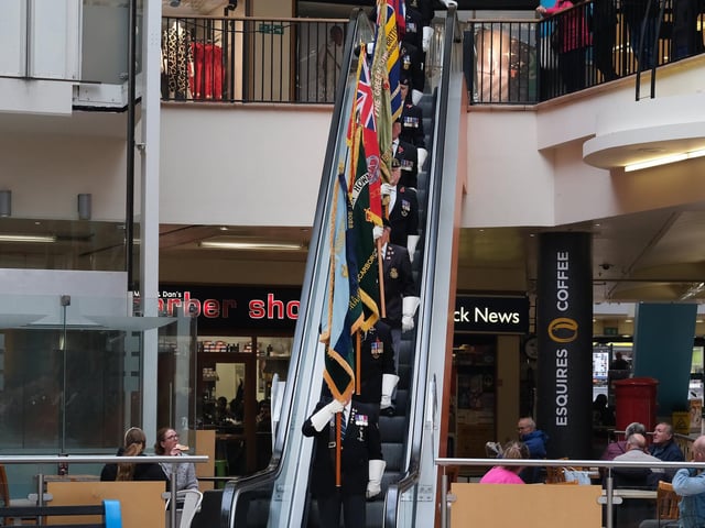 Standard bearers descend