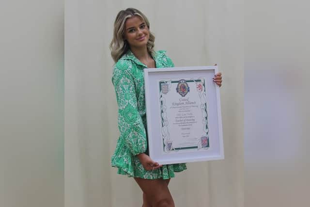 Tilly-Lou Noble with her teaching diploma.