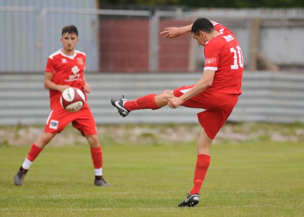 Debutant Danny Clarke in action on his Bridlington Town debut, the 1-0 Bank Holiday Monday win against Grimsby Borough  PHOTOS BY DOM TAYLOR