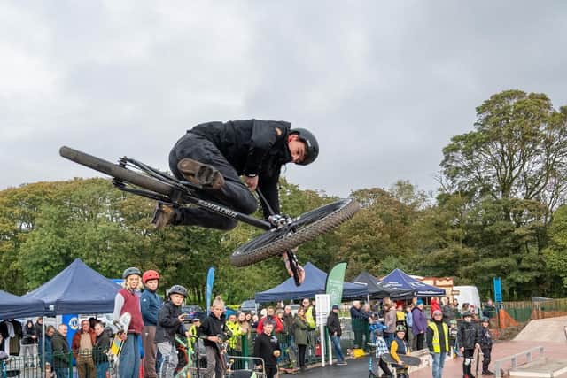 A cyclist trying out the new skate park in front of crowds at the official opening event on Saturday.