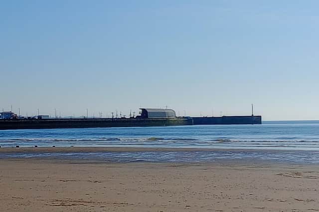 Ollie Appleby frames Bridlington harbour from the beach.