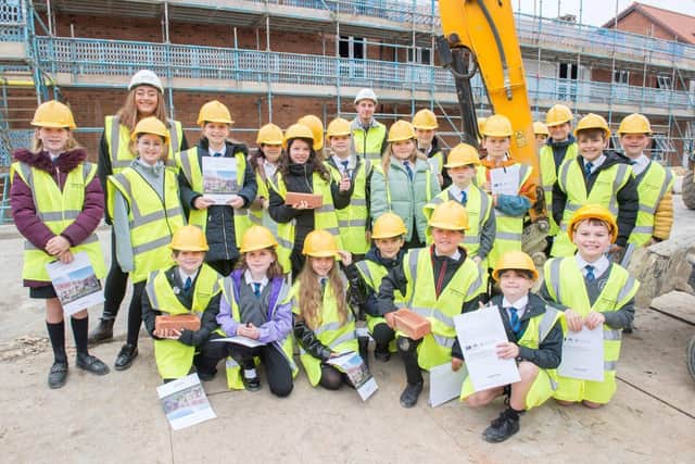 Pupils from Stakesby Primary Academt shown around by McCarthy Stone