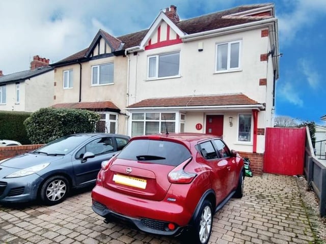 This extended semi-detached home has parking space to the front, with an extensive garden to the rear.