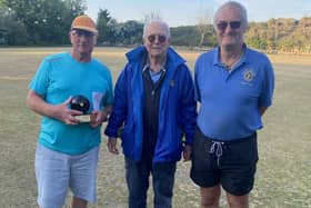 Paul Morgan, left, won the North Cliff merit, with club president Dave Hill and runner-up Alan Lee.
