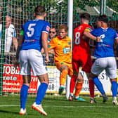 A home effort is ruled not to have crossed the line during the 3-1 home loss for Whitby Town against Warrington Rylands. PHOTOS BY BRIAN MURFIELD
