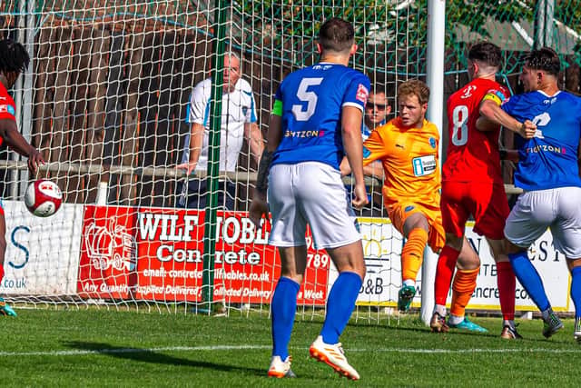 A home effort is ruled not to have crossed the line during the 3-1 home loss for Whitby Town against Warrington Rylands. PHOTOS BY BRIAN MURFIELD
