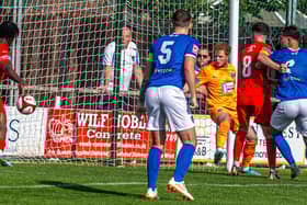 A home effort is ruled not to have crossed the line during the 3-1 home loss for Whitby Town against Warrington Rylands. PHOTOS BY BRIAN MURFIELD