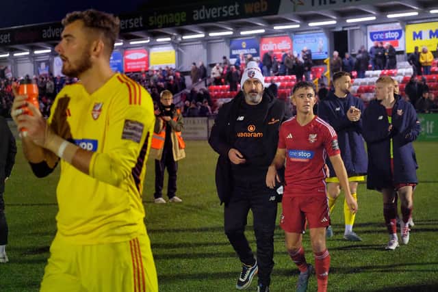 Keeper Ryan Whitley, boss Jono Greening and Lewis Maloney thank the fans.