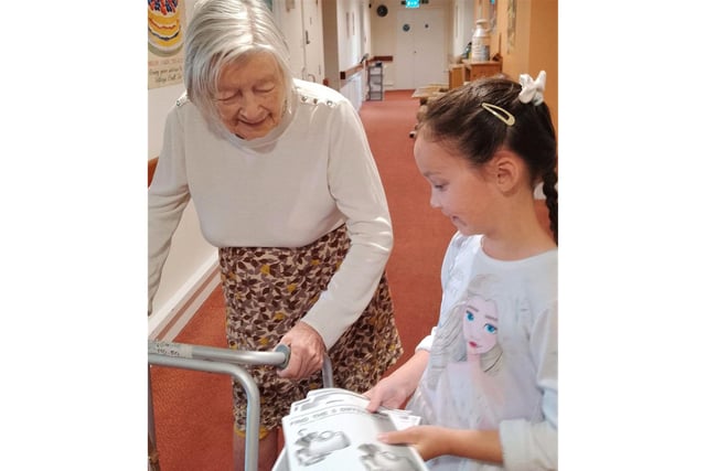 Pictured is a young lady called Grace, who brought lots of smiles to both residents and staff.
