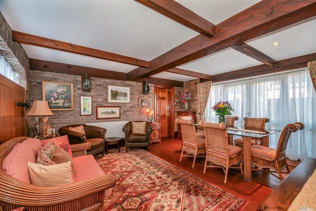 The beamed dining room.