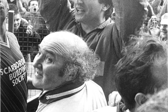 Neil Warnock celebrates Scarborough FC's promotion as Conference champions