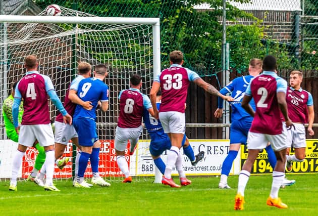 Harrison Beeden (number 6) scores the opener for Town in their 2-1 home success against South Shields on Tuesday. PHOTO BY BRIAN MURFIELD