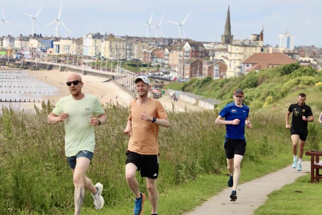 Brid Road Runner James Briggs, light green shirt, won Sewerby parkrun. PHOTOS BY TCF PHIOTOGRAPHY