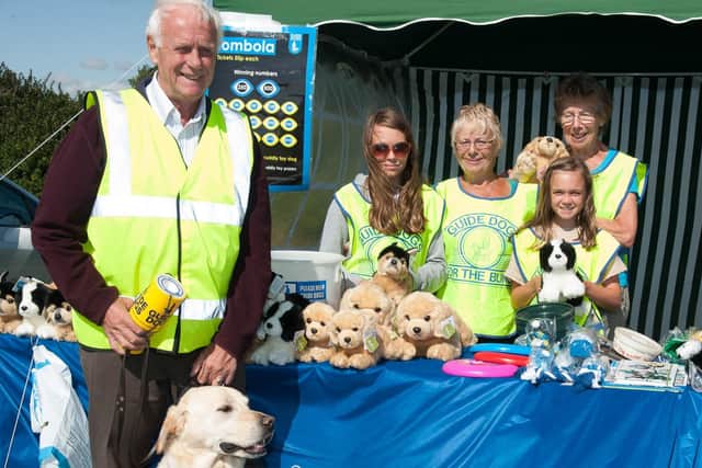 Derek with Kibo and Lauren, Irene, Grace and Joyce at the Lions Carnival in 2014.
